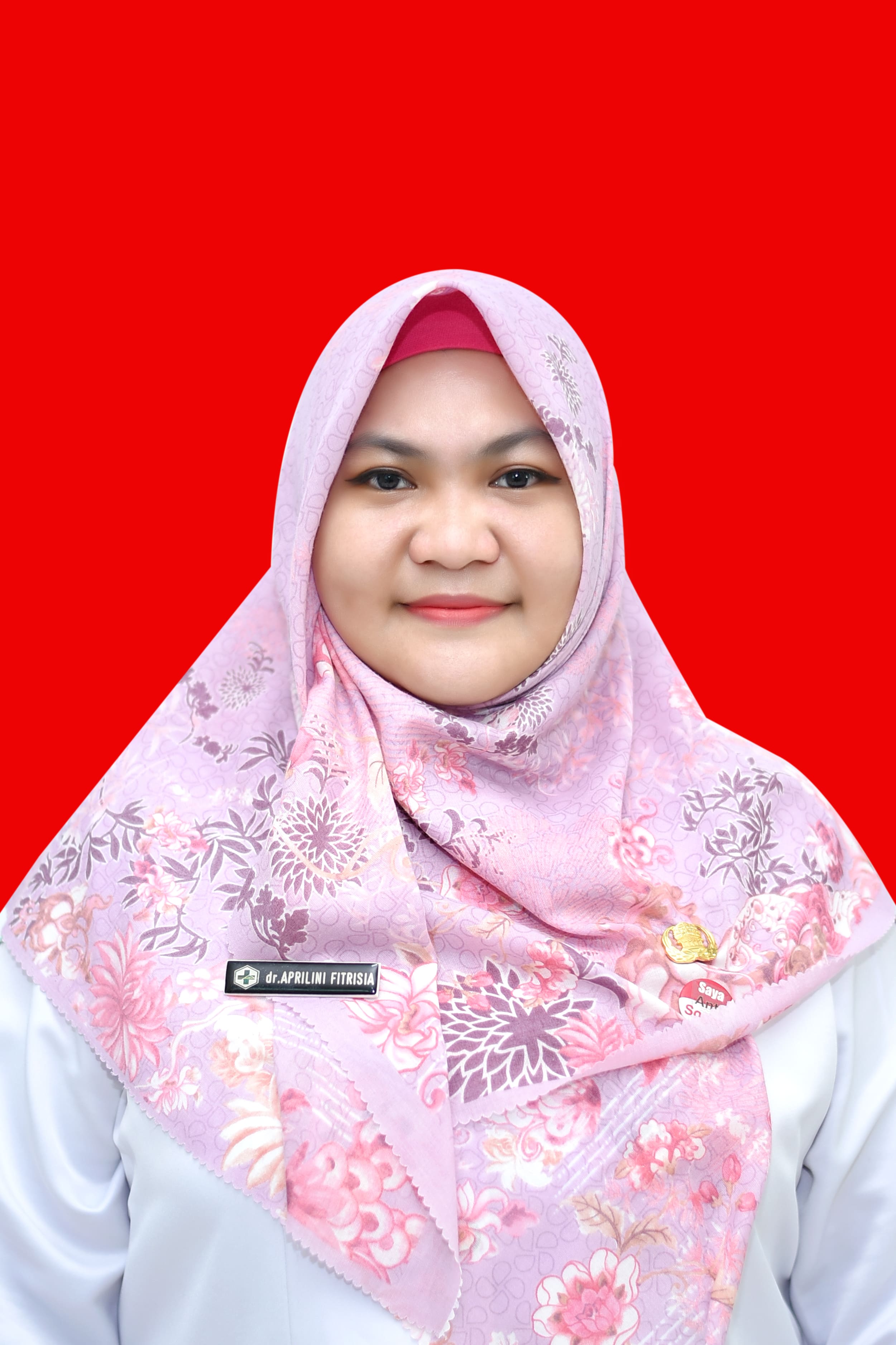 dr. Aprilini Fitrisia